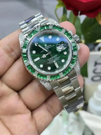 Rolex Submariner Date, 18K White Gold Diamonds Emerald