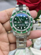 Rolex Submariner Date, 18K White Gold Diamonds Emerald