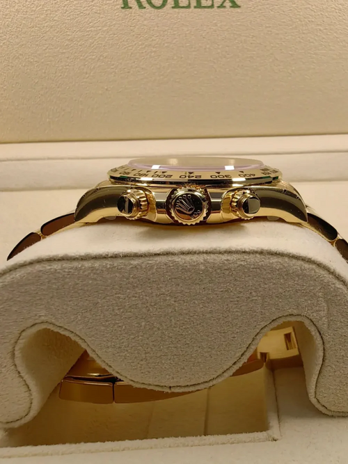 B – Rolex Cosmograph Daytona Yellow Gold Paul Newman Dial